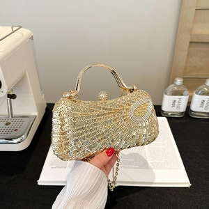 Golden sequin half-moon evening clutch bag with metal handle and elegant chain strap