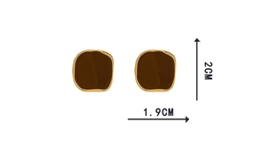Detailed view of brown square vintage earrings with 1.9cm width and 2.0cm height size markers