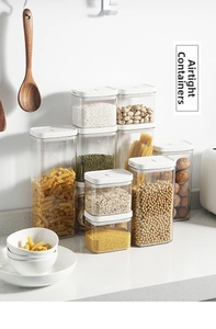 Stackable food storage containers with airtight white lids for dry goods and grains