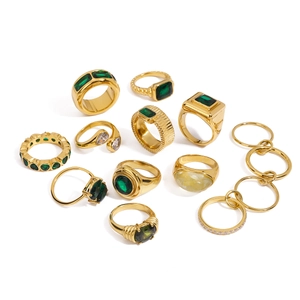 Vintage gold plated stainless steel ring set with green gemstones and clear crystals