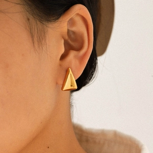 Minimalist 18K gold plated stainless steel triangle stud earrings for women on model
