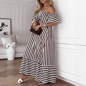 Detail of off-shoulder striped maxi dress featuring ruffled cuffs and vertical patterns