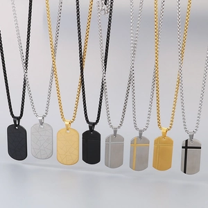 Minimalist stainless steel dog tag necklace collection with cross and cracked texture