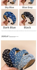 Detailed view of knotted denim headbands featuring faux pearls and sparkling rhinestones