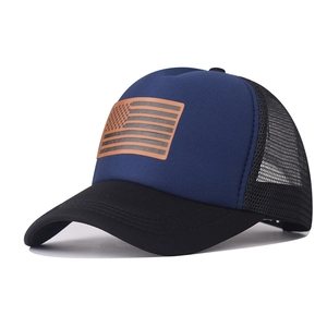 Detail of breathable mesh and US flag leather patch on the trucker baseball cap