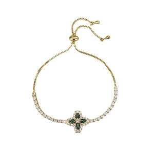 Adjustable gold bracelet with emerald green clover and white zircons on white background