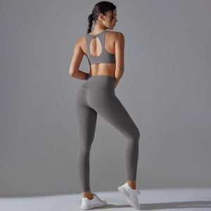 Grey high waist yoga set featuring seamless sports bra and leggings for gym fitness workout