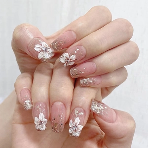 Faux Ongles Longs À Presser Avec Fleurs Blanches Texturées Et Feuilles D'or Élégants Ongles Rose Pailletés Pour Femmes Fête