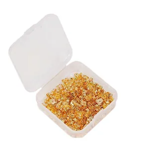 Bulk gold zinc alloy earring backs in a clear frosted plastic storage box organizers