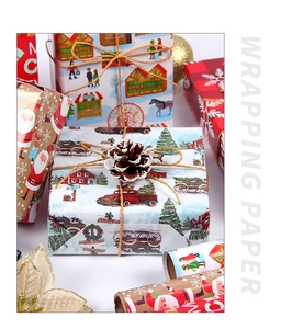 Detail of Christmas wrapping paper with Santa and snowy village patterns on gift boxes