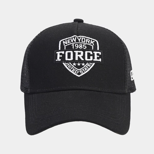 Detailed view of the New York 1985 embroidery and breathable mesh on this black trucker cap