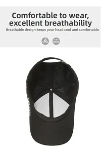 Detail view of the breathable mesh lining and metal buckle adjustment on black baseball cap