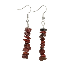 Detail of silver drop earrings featuring natural reddish-brown irregular stone beads