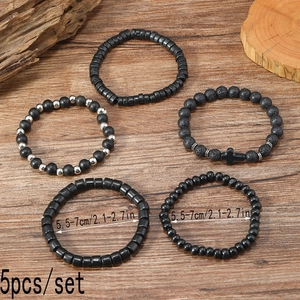 Detailed view of 5-piece men's wood bead and lava stone bracelet set with size info