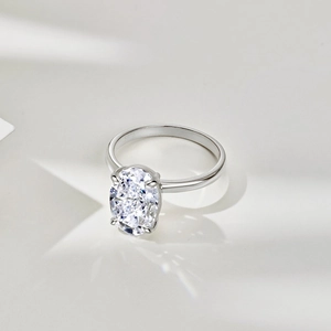 Macro detail of S925 sterling silver ring showing the oval clear gemstone and hallmark