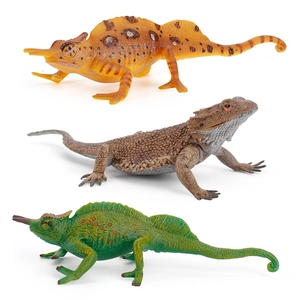 Realistic toy set of three plastic lizard figures including chameleon and bearded dragon