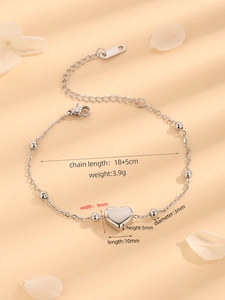Detailed view of silver heart pendant bracelet with dimensions and lobster clasp info