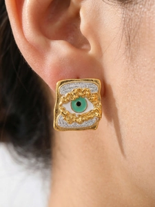 Detailed close-up of square evil eye stud earring with gold plating and zircons