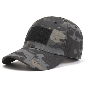 Detail of dark camouflage tactical baseball cap with front velcro patch and mesh eyelets