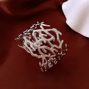 Minimalist silver hollowed-out wide open cuff bracelet with coral branch texture