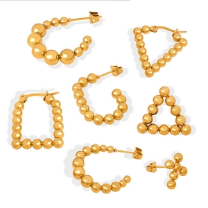 Retro U-shaped and geometric 18k gold plated beaded earrings set on white background