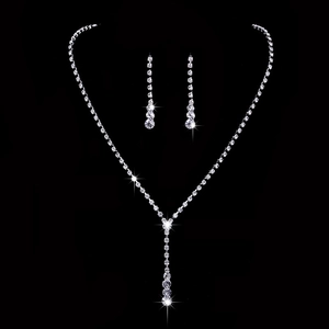Elegant silver Y-shaped rhinestone necklace and drop earrings set for bridal jewelry