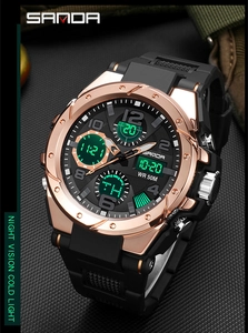 Dettaglio orologio sportivo con lunetta in metallo oro rosa, display doppio e luce