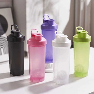 A vibrant lineup of five plastic shaker bottles in black pink purple white and green