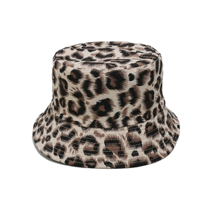 Close-up detail of the classic leopard print pattern on a stylish women's bucket hat