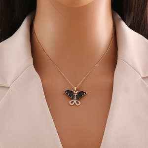 Elegant gold butterfly necklace for women with black zircon wings and sparkling crystals