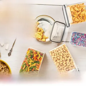 Detailed top view of airtight food storage containers on wooden table with cereals