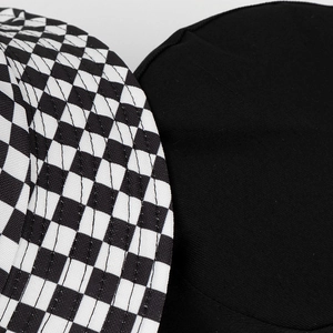 Close-up of black and white checkerboard pattern and high-density cotton canvas stitching
