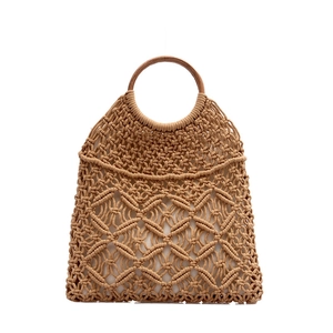 Handwoven cotton rope beach bag with round wooden handles and hollow diamond pattern
