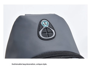 Macro detail of waterproof grey oxford fabric chest bag featuring a silicone earphone port