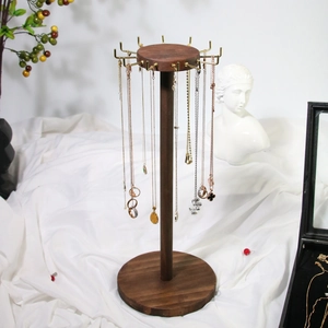 Elegant wooden necklace display stand with ten golden metal hooks and round base