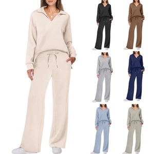 Women's two-piece casual lounge set with V-neck top and wide-leg pants in cream white color