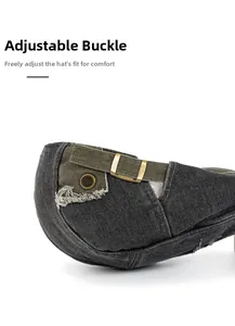 Détail du béret en denim délavé avec boucle réglable en bronze et bords effilochés
