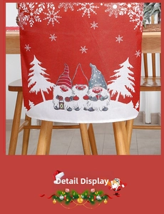 Detail of red Christmas chair cover with festive gnomes and snowflake linen texture
