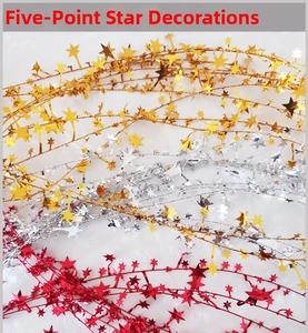 Detail of star-shaped Christmas tinsel garland in metallic gold, silver, and red colors
