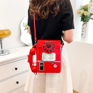 Quirky red retro telephone shoulder bag with dial detail and handset handle for women