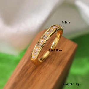 Macro shot of 18K gold plated ring with alternating pearls and cubic zirconia stones