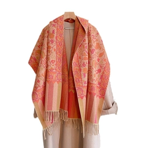 Ethnic paisley floral shawl with tassels in warm pink and orange tones