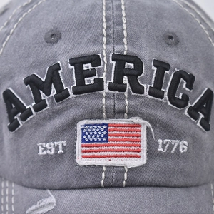 Distressed grey baseball cap with embroidered America text and 1776 US flag details