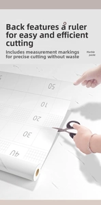 Detail of marble contact paper backing with grid lines for precise easy cutting