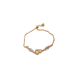 Adjustable golden hulu bracelet with yellow gemstones and zircon butterfly accents