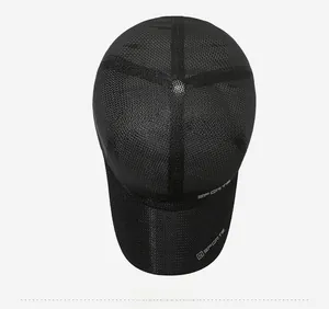 Close-up of black breathable mesh fabric on a sports baseball cap with N logo detail