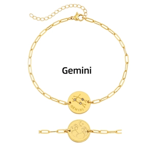 Close-up of Gemini zodiac bracelet with constellation and twin figure engraving