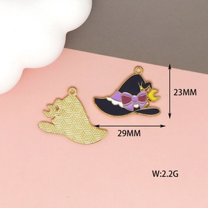 Detail view of witch hat enamel pendant showing front purple bow and gold back size dimensions