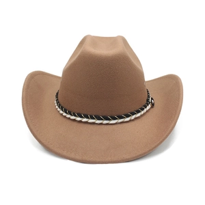 Detail of camel wool felt cowboy hat featuring woven band and round metal button ornament