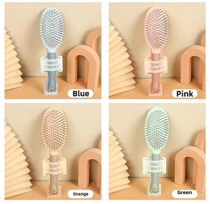 Detailed grid view of colorful portable hair brushes with air cushion and massage bristles